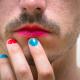 Man with lipstick and nail polish