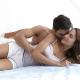 Sensual man and woman in bed