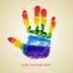 Hand with rainbow colours asking to stop homophobia