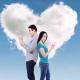 Man and woman over the phone in front of cloud