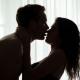 Silhouette of passionate kissing couple