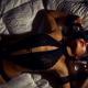 Woman with black lingerie and blindfold