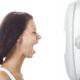Woman screaming at the fan - hot flash?