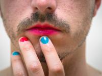 Man with lipstick and nail polish
